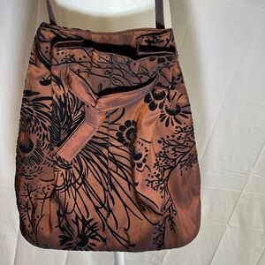 Vintage looking purse. No brand name. Beautiful unique bag.